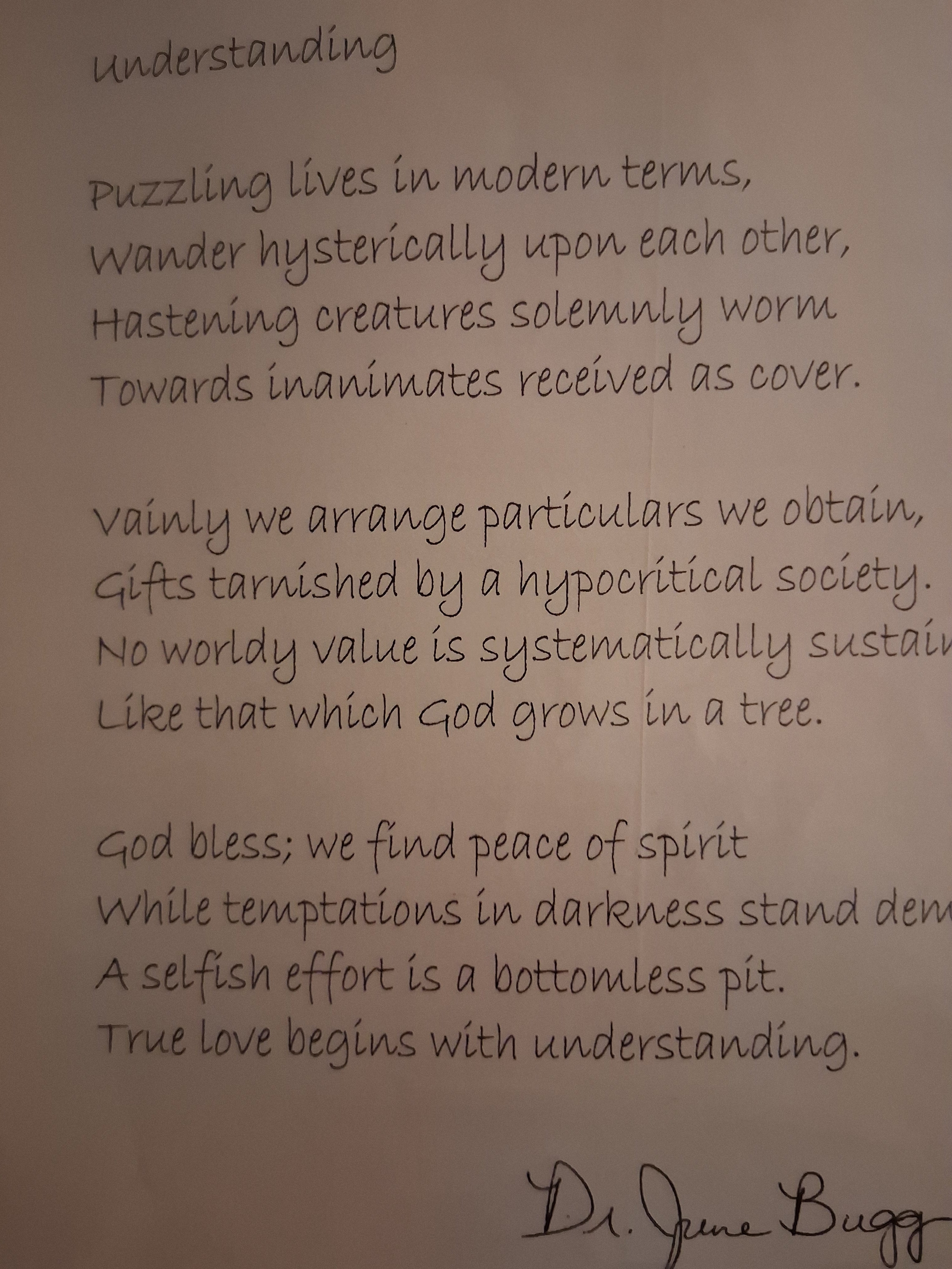 A handwritten poem or letter printed on light beige paper, with black ink text and a cursive signature at the bottom reading, as alias ''Dr. JuneBugg.'' The author is Eddie Wyatt, Jr.